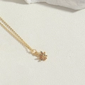 Macro detail of gold maple leaf pendant with colorful zircon stones on thin chain - Colorful Zirconia Flower Style (XL3180-6)