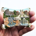 Detailed close-up of a resin Rome souvenir magnet featuring Colosseum relief and landmarks - Rome 4 Landmarks Scroll
