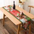 Detail of Christmas table runner with knitted Santa motifs, snowflakes and festive tassels - Knit Santa Claus Style