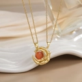 Detailed view of crescent moon necklace with brown gemstone and pavé zircon accents - Gold Crescent Red Gemstone Necklace XL0284A