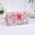 Pink floral cotton makeup bag with a bow detail and secure zipper closure for travel - With Bow / Rose Red Large Flower