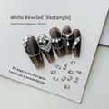 Detail of 2x4mm rectangular white zircons on nails, pack of 50 sparkling nail art crystals - White Rectangle 2x4 (XY-1004)
