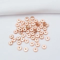 Flat rose gold spacer beads in disc shape for DIY jewelry making on white fabric - 3mm / Rose Gold Plated (Color Retention)