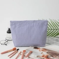Blue and white seersucker striped makeup bag for travel storage and toiletries - Navy Striped