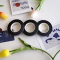 Three rolls of dark green floral tape for DIY bouquet wrapping and stem styling - 10 Black