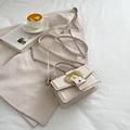 Elegant cream leather small square bag with vintage gold buckle and top handle - Off White