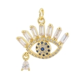 Macro detail of 18K gold plated evil eye charm with micro-pawned zircon stones - 14-Sun Evil Eye