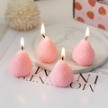 Pink strawberry shaped scented candles with realistic texture on a marble tray - Pink Mini Strawberry Candles 4-Pack