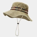 Detail of khaki canvas hiking hat with ethnic woven band and adjustable chin cord - Khaki