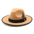 Detail of camel wool fedora hat featuring black ribbon bow with vintage metal buckle and feather - M (56-58cm) / Camel