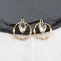 Coppia di ciondoli tondi intrecciati placcati oro 18k con zircone ovale per creazione gioielli - Trasparente