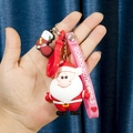 Cartoon Santa Claus PVC keychain with pink wristband and red green Christmas stocking charm - Large Rope Santa