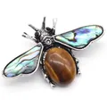 Vintage silver bee brooch featuring tiger eye stone and iridescent abalone shell wings - Tiger's Eye