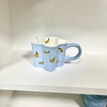 Tazza in ceramica azzurra a forma di stella con motivi di banane e manico curvo - 320ml / Banana Blu