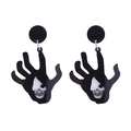 Detailed view of gothic acrylic earrings featuring hand palm shape with skull cutouts - Skeleton Hand Style