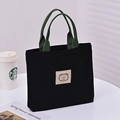 Mini corduroy tote bag in black and green contrast with cartoon bear patch - Black (Green Strap)