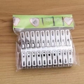 Pack de 20 pinzas de acero inoxidable duraderas para secar ropa sobre superficie madera - Pinzas Planas de Acero Inoxidable [20/Paquete]