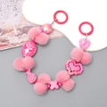 Pink plush ball beaded phone wristlet strap with heart charms and person profile pendant - Rose Red Cameo Style (K2769)