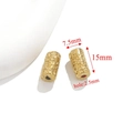 Detail showing 15mm gold textured stainless steel tube bead with 2.5mm hole size - Style C-Hammered Cylinder / Gold