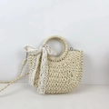 Handmade woven straw crossbody bag in cream white featuring lace bow and ring handles - Beige with Lace