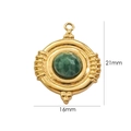 Macro shot of 21mm vintage gold-plated pendant with green faceted gemstone detailing - Accessory 1-African Jade