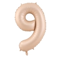 Close-up of champagne cream number 9 foil balloon with metallic texture for party decor - Number 9 / Caramel color