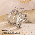 Anillo ajustable de tres capas en acero inoxidable plateado con acabado martillado - Espiral Multicapa Martillado / Color Acero
