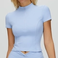 Top sportivo azzurro aderente con colletto a lupetto e mezza zip per lo yoga - Blu