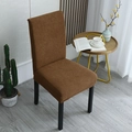 Brown elastic chair cover with textured knit fabric on black dining chair in cozy home setting - General Specification / Light Coffee