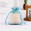Light blue drawstring pouch with cotton linen and organza panel filled with white pearls - Lake Blue