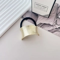 Minimalist black elastic hair tie with a textured golden curved metal accent - Style P Light Gold
