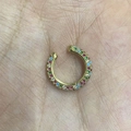 Rainbow cubic zirconia ear cuff with 18K gold plating held in hand for scale - Gold Mix Colorful Zirconia 1PC