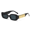 Retro oval sunglasses with black frame and gold gemstone metal temple accents on white background - Dark Grey
