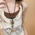 Bohemian long pendant sweater necklace with colorful beads and bronze metallic hollow charm - Colorful Woven Round Style