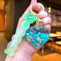 Detail of heart liquid quicksand keychain with stars and Fairy Tales strap - Bow [green] Glowing Bubble Beads Heart