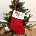 Knitted Christmas stocking in red with embroidered white cuff and red letter R - Letter R