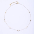 Close-up of golden titanium steel chain with iridescent crystal beads and lobster clasp - Transparent Iridescent Beads