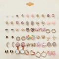 30-pair earring set featuring stars, bows, and flowers on a textured display card - Pink Gold Flower Fairy Tale (FX793)