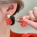 Elegant festive red dragon drop earrings with cream beads worn by model - Silver Earring Post - White - Red Dragon