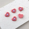 Close-up of pink resin heart charms with purple centers for DIY crafts accessories - 1# Pink and Purple