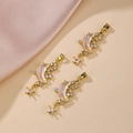 Three gold crescent moon pendants with pavé zircons and iridescent resin for DIY jewelry - Clear
