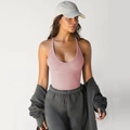 Pink rib-knit slim fit bodysuit part of a coordinated women's sporty loungewear set - Pink