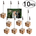 Detail view of 10-piece wooden memo holder set with a metal alligator clip holding a photo - Alligator Clip Wood Base Style (JM00818)