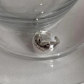Minimalist 925 sterling silver ring with LOVEME engraving on a glass surface - JZ0419 (LoveMe Engraved)