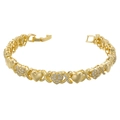 Close-up of gold XOXO link bracelet featuring paved crystals and polished heart charms - Heart X Link Chain / Gold Heart VL402