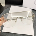 Occhiali da sole moderni oversize a mezza montatura con bordo argento e lenti panoramiche - Montatura Argento Lenti Specchio Oro