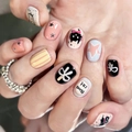 Detail of short round hand-painted press-on nails with Black Cat and star patterns - By1599 Five-star Black Cat / Glue Type