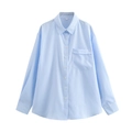 Detail of light blue striped shirt featuring a classic collar and front patch pocket - XS / Sky Blue