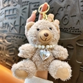 Cute plush bear keychain featuring pearl necklace and silver heart pendant charms - Pearl Chain Plush Bear