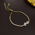 Detail of adjustable golden slider bracelet with marquise-cut sparkling zircon stones - Butterfly Design / Gold